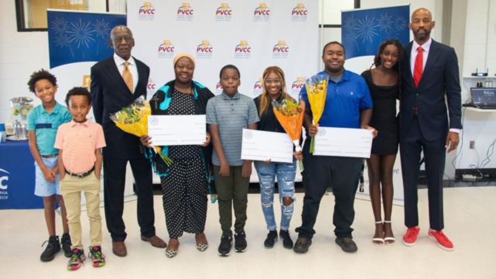 Students receive scholarships through new program named for form -